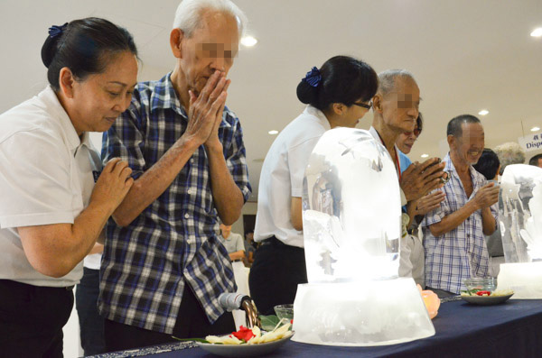 A Small-Scale Buddha Bathing Ceremony for the Needy